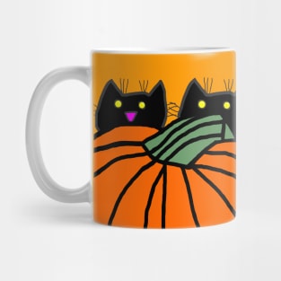 Kittens hiding in the Pumpkin Pile for Halloween Mug